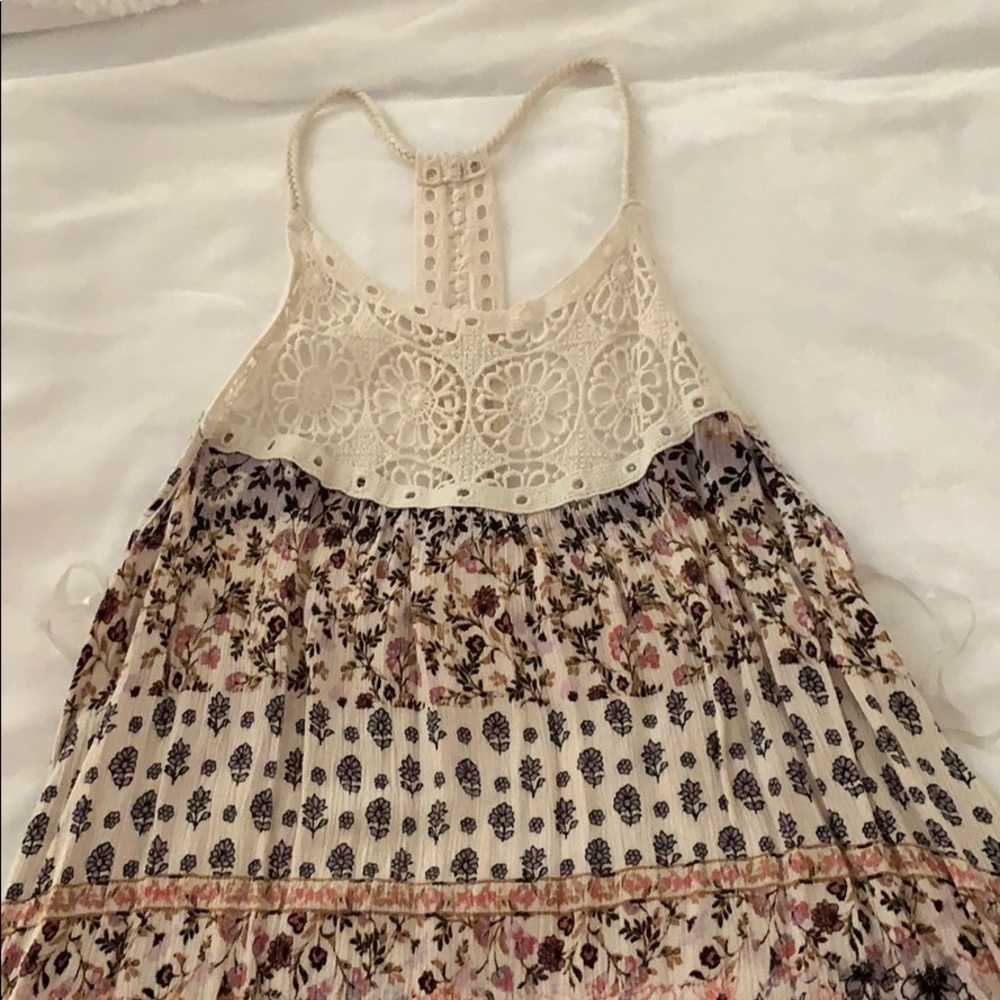 Tank top with thin straps.